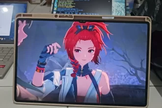 Samsung Galaxy Tab S9 Ultra resting on a desk with S Pen, showcasing its 14.6-inch AMOLED display for work and entertainment.