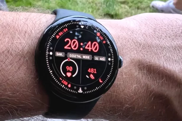 Google Pixel Watch 3 45mm in Matte Black on a wrist, showing the larger circular OLED display and sleek stainless steel design