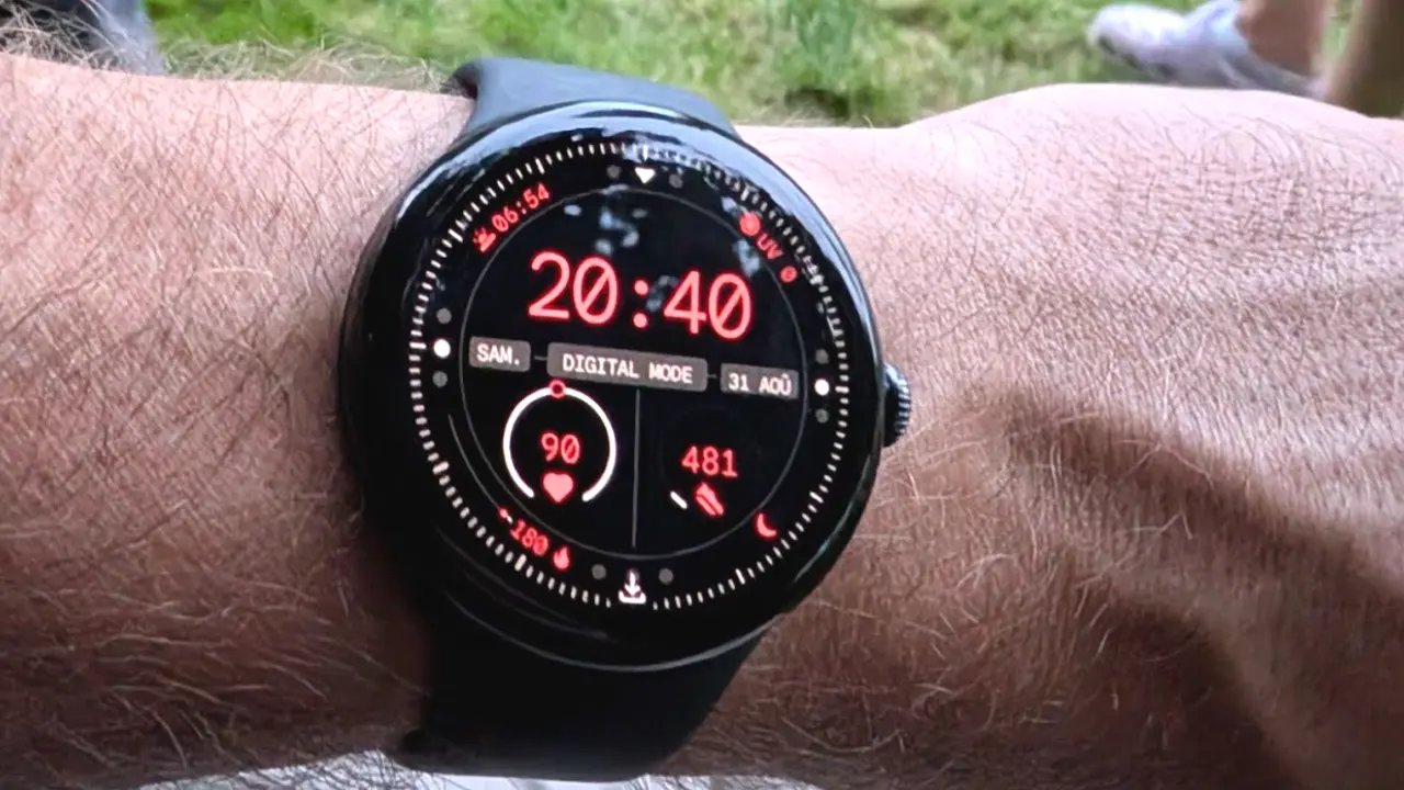 Google Pixel Watch 3 45mm in Matte Black on a wrist, showing the larger circular OLED display and sleek stainless steel design