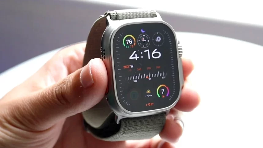Close-up of Apple Watch Ultra 2 displaying real-time ECG and blood oxygen readings on 1.92-inch Retina display.