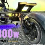 Dualtron Storm Thunder 3 review side profile showing reinforced stem and aggressive Thunder 3 design on asphalt.