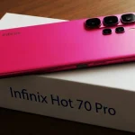 Infinix Hot 70 review showcasing the Thermo Orange color-changing back panel and 6.78-inch 120Hz display
