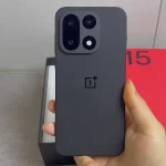 The new OnePlus 15 smartphone showing its flat display and triple camera module.