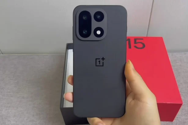 The new OnePlus 15 smartphone showing its flat display and triple camera module.